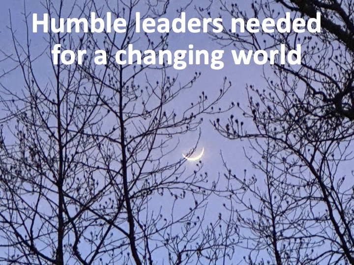 Title slide, "Humble leaders needed for a changing world" Background photo shows a budding tree in front of a new moon.
