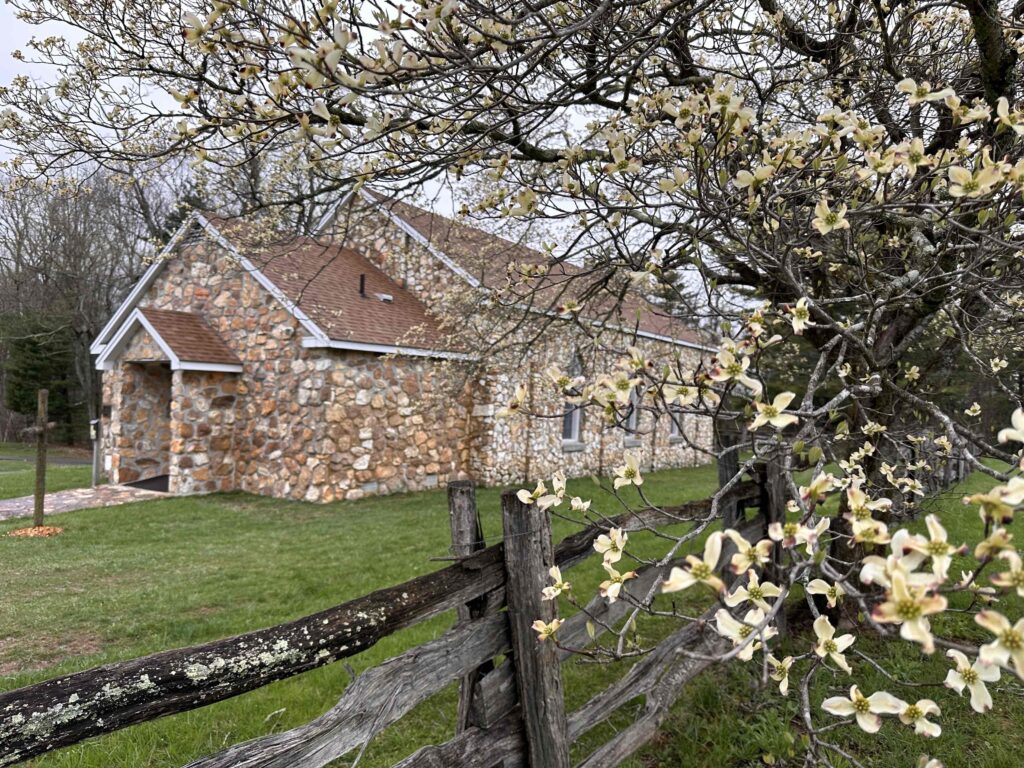 Bluemont Church with blooming dogwood
