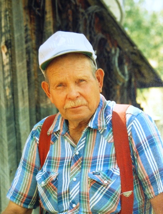 Eddie Larson at a cabin on Cedar Mountain