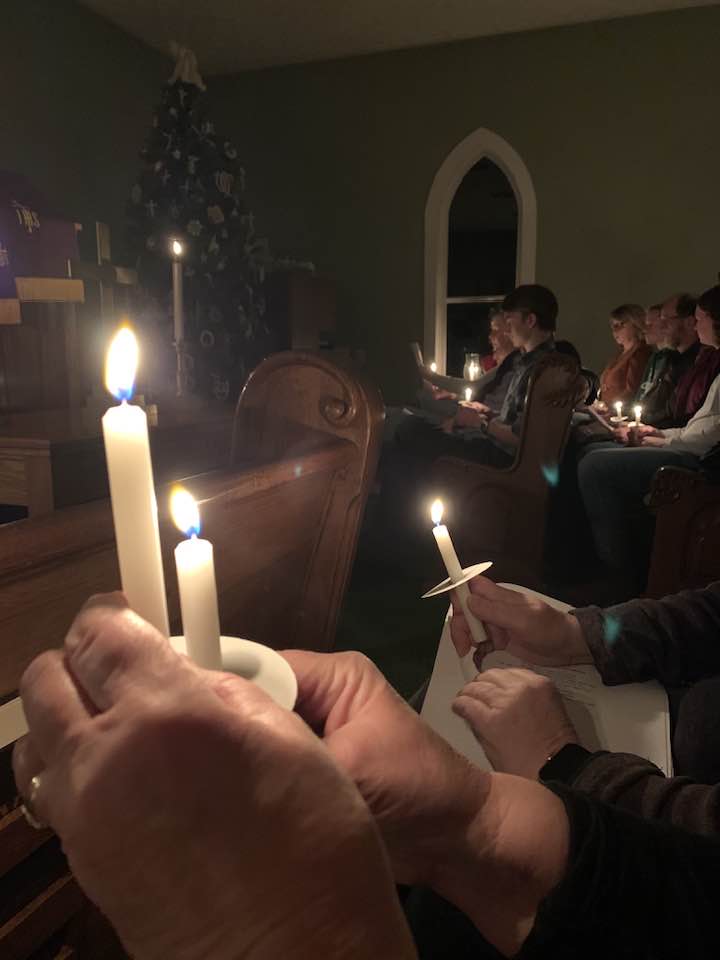 Lighting of candles during Christmas Eve Worship