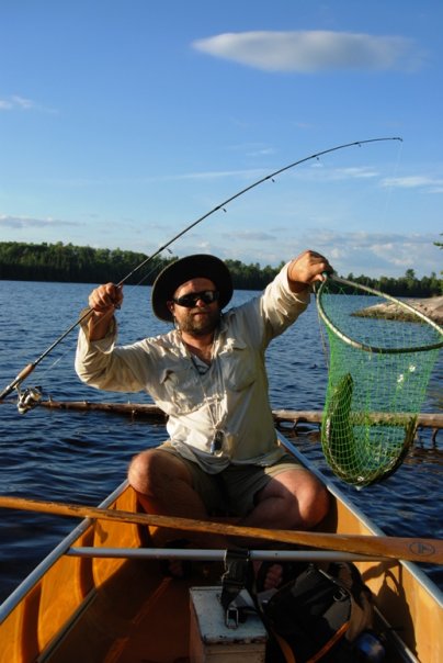the author fishing at sunset in the Quetico Wilderness in Western Ontario 
