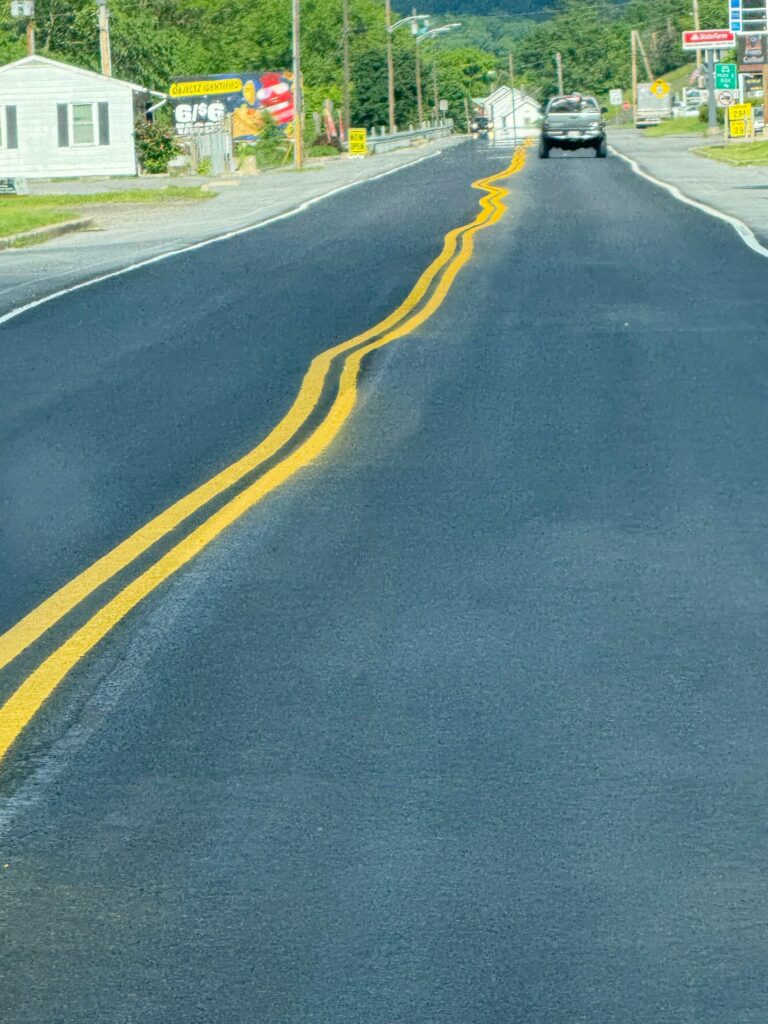 curvy lines on a straight road
