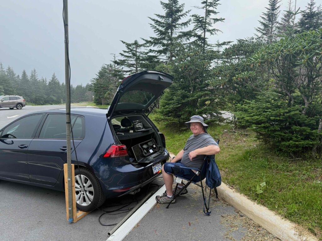 radio operator working out of the back of his car